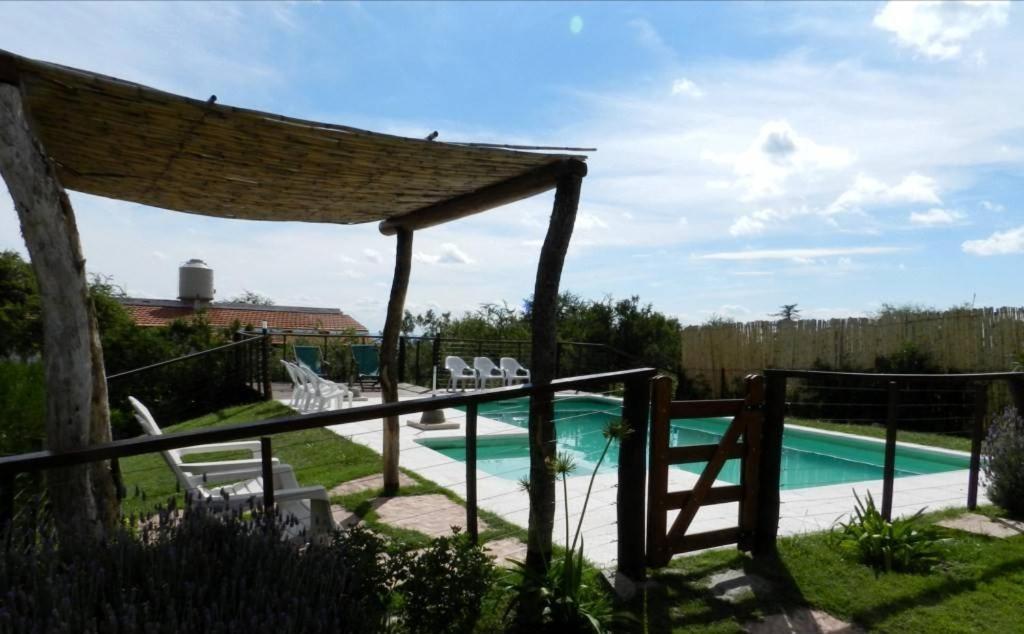 Barranca Del Indio Aparthotel Villa de Merlo ภายนอก รูปภาพ